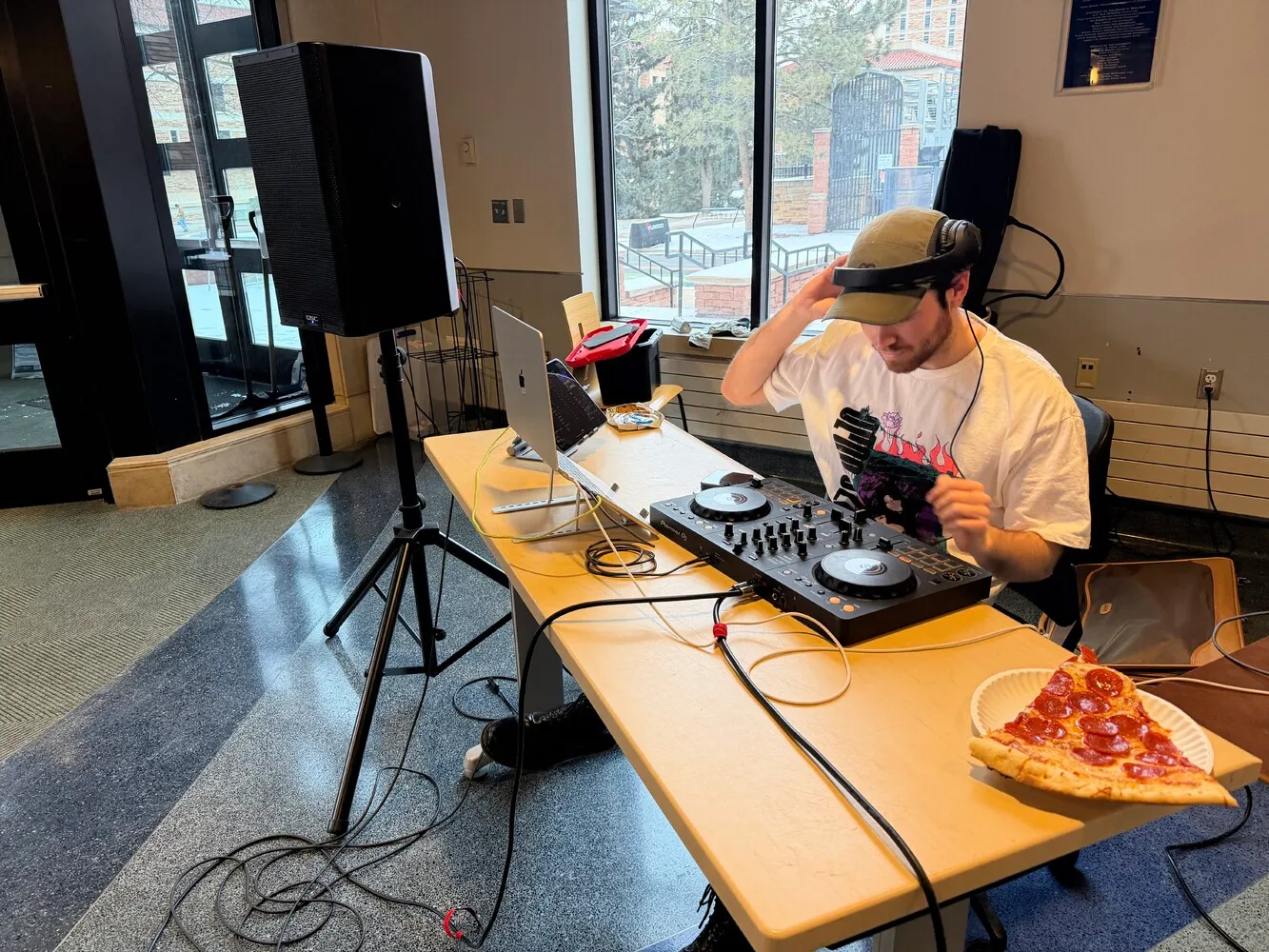 ATLAS student Cross Hessler DJing for the game jam.