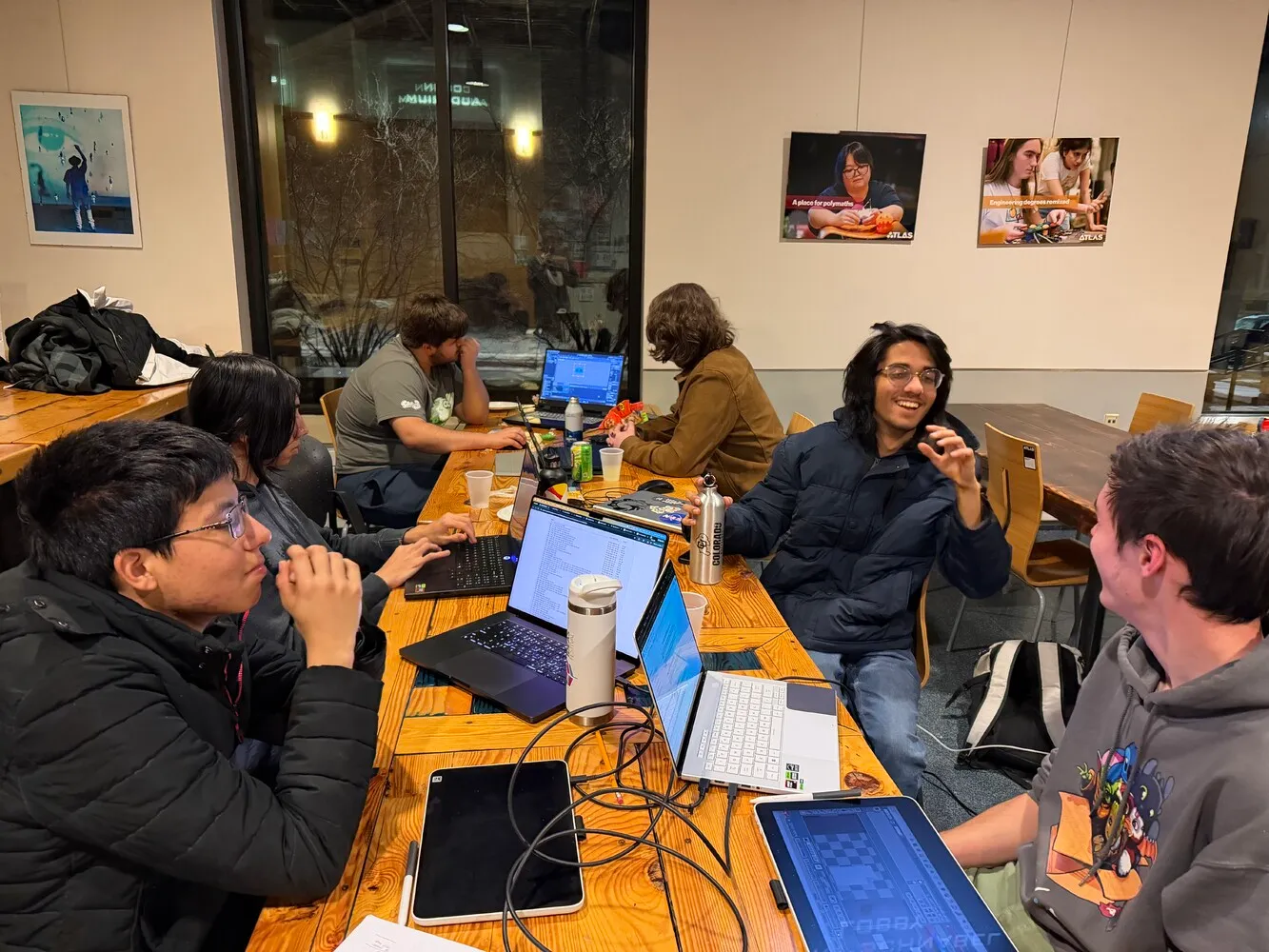 Team members working on their game